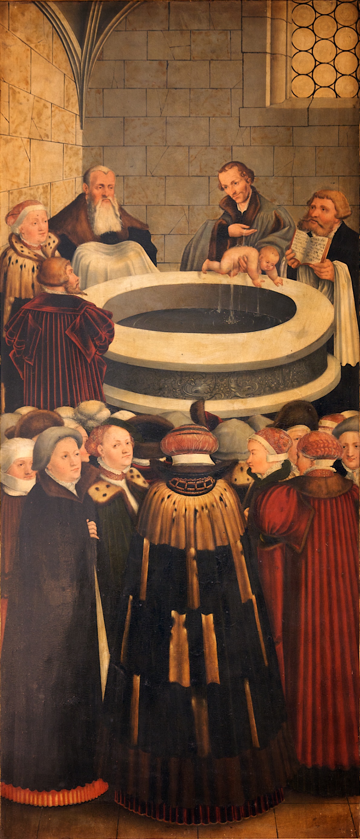 Philipp Melanchthon baptizes an infant, left wing of the Wittenberg Altarpiece, 1547–1548